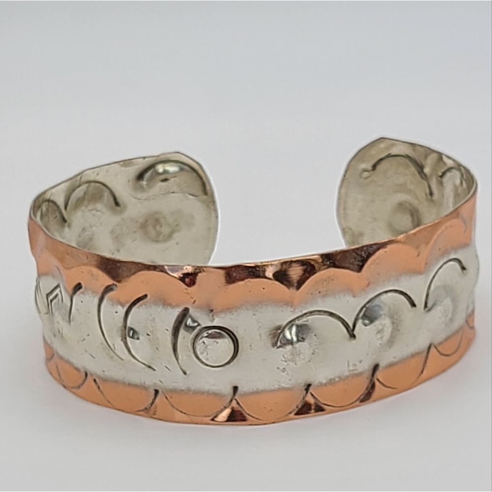 Southwestern hammered copper silver cuff bracelet. Hand stamped
